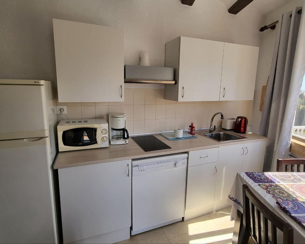 Apartamentos El Tosal 7E 칼페 외부 사진